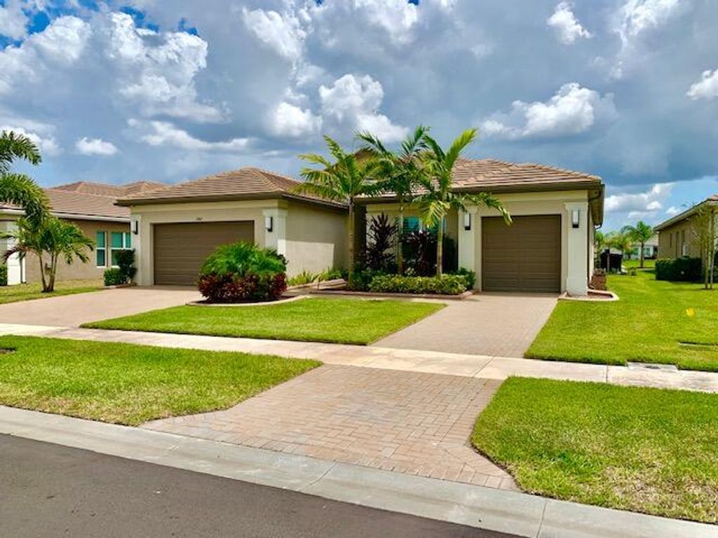 Photo of 11967 SW Chestnut Grove Drive, Port Saint Lucie, FL 34987 (MLS # R10792263)