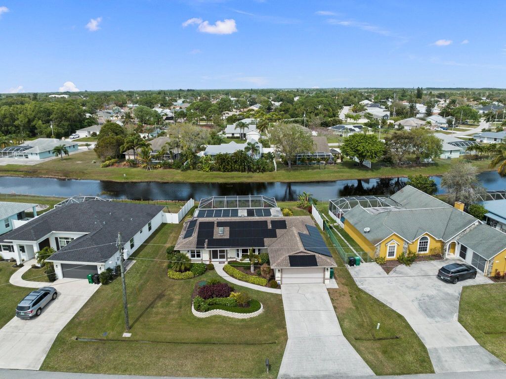 Photo of 2761 SE Rawlings Road, Port Saint Lucie, FL 34952 (MLS # R10967919)