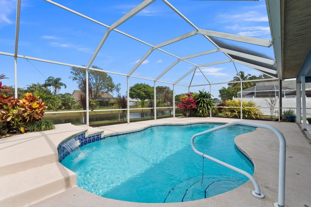 Photo of 2761 SE Rawlings Road, Port Saint Lucie, FL 34952 (MLS # R10967919)