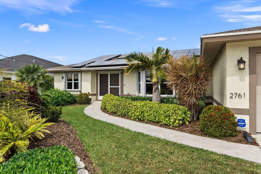 Photo of 2761 SE Rawlings Road, Port Saint Lucie, FL 34952 (MLS # R10967919)