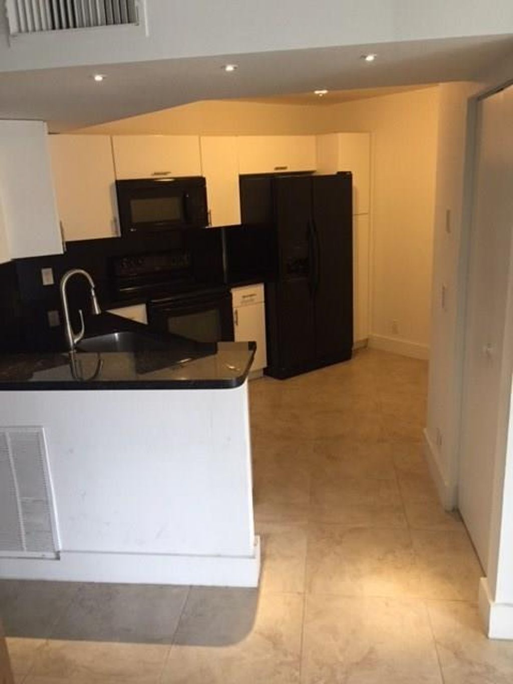 Photo of 8761 Wiles Rd #103, Coral Springs, FL 33067 (MLS # F10540878)