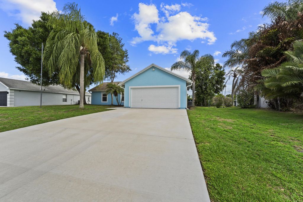Photo of 243 SW Aubudon Avenue, Port Saint Lucie, FL 34984 (MLS # B26009937)