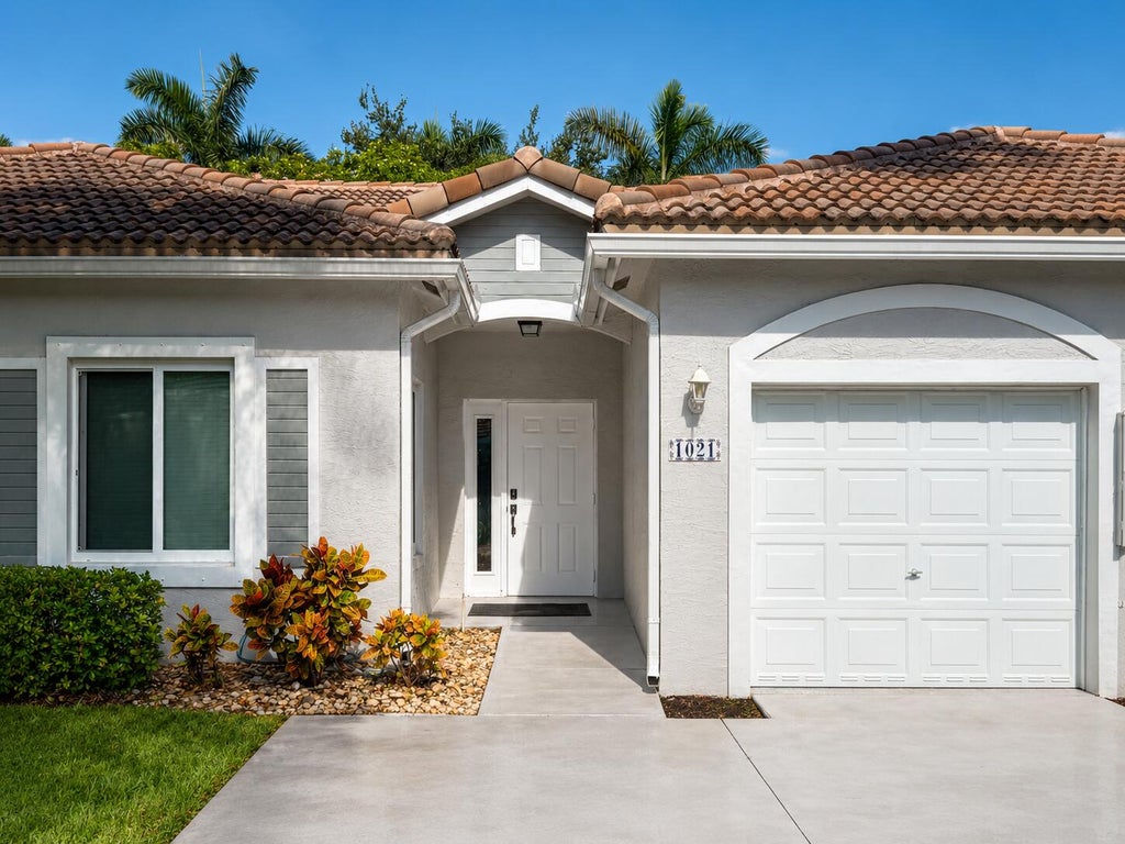 Photo of 1021 SW 42nd Terrace, Deerfield Beach, FL 33442 (MLS # B26068874)