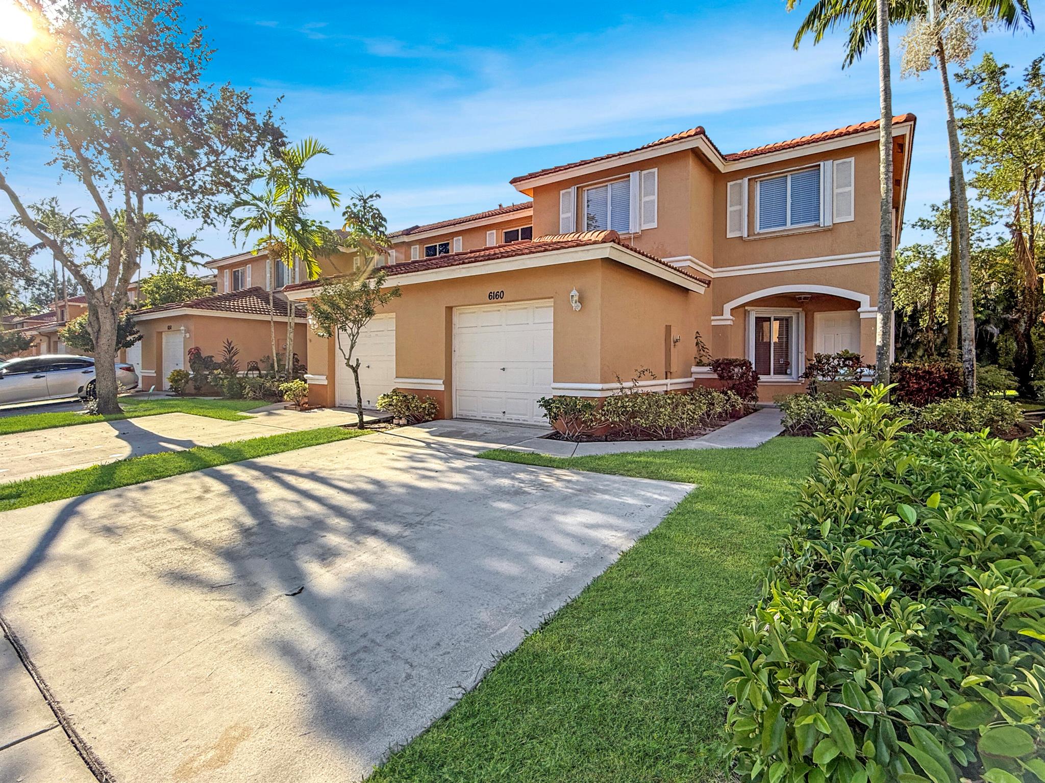 Welcome to 6160 Sugar Loaf Lane in the desirable gated community of Briar Bay. This 3-bedroom + Den/Office (Able to convert to 4th bedroom), 2.5-bath home features an open floor plan with high ceilings, a bright living area, and an updated kitchen with ample cabinetry and Quartz countertops. The primary suite includes a walk-in closet while the split-bedroom design offers privacy. Relax on the private patio with lush landscaping. Community amenities include a clubhouse, fitness center, resort-style pool, tennis and pickleball courts, playgrounds, and walking trails. Conveniently located minutes from Okeechobee Blvd, the Turnpike, I-95, downtown West Palm Beach, Palm Beach Outlets, and beaches.