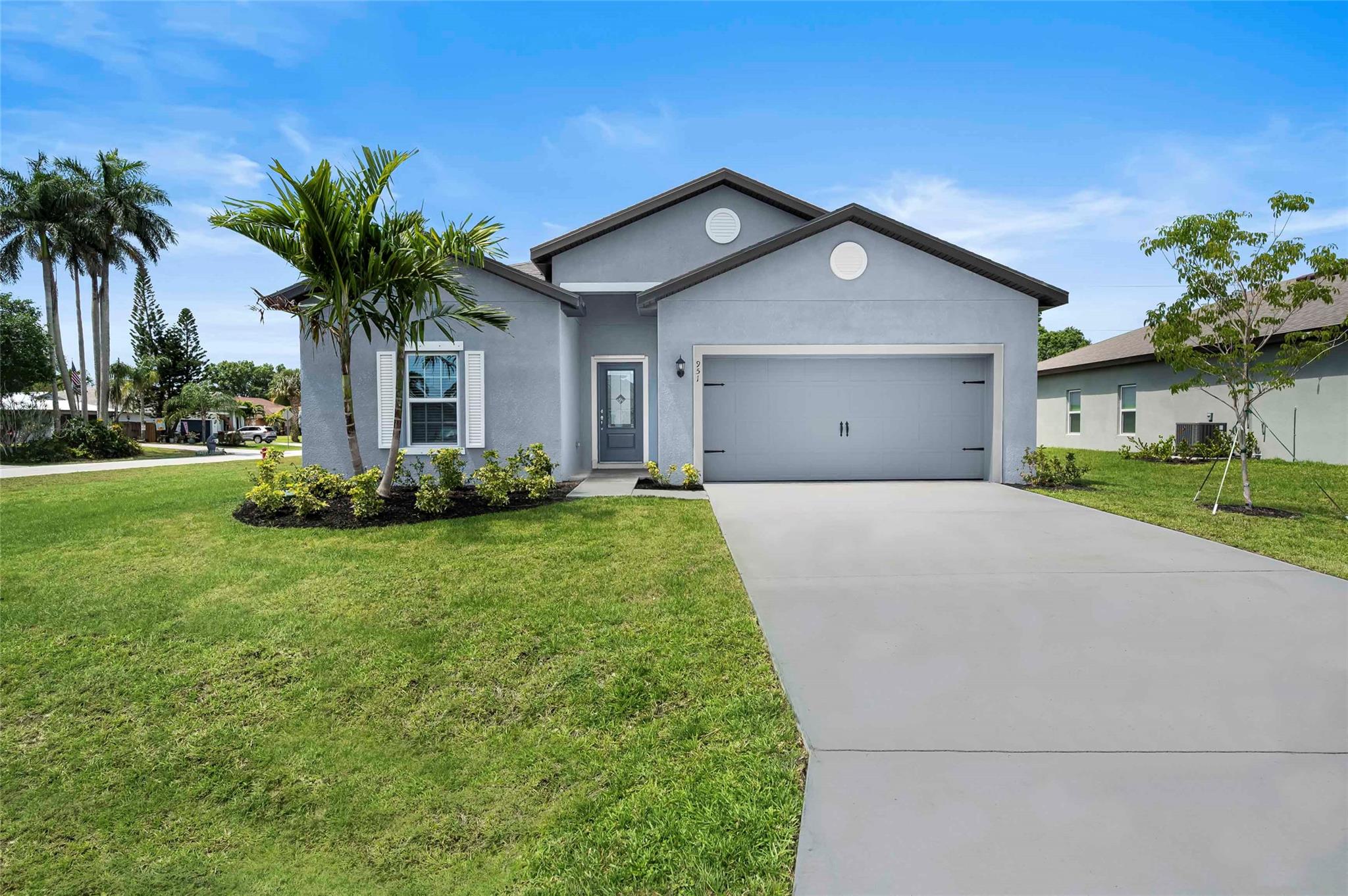 Ask us about our builder paid closing costs & no down payment options! Located within the highly sought-after area of Port St. Lucie, the Coral is move in
ready. This one-story home features an open-concept floor plan, 5 bedrooms and 3 full baths
complete with thousands of dollars’ in upgrades included. Features such as energy-efficient Whirlpool®
appliances, sprawling granite countertops in the kitchen, beautiful wood cabinets, brushed nickel
hardware and an attached two-car garage. The Coral also consists of a covered back patio, front yard
landscaping and a master suite complete with a massive walk-in closet. Port St. Lucie
residents looking to live in a premier location are presented with a plethora of local area attractions. *Appliance models are subject to availability.