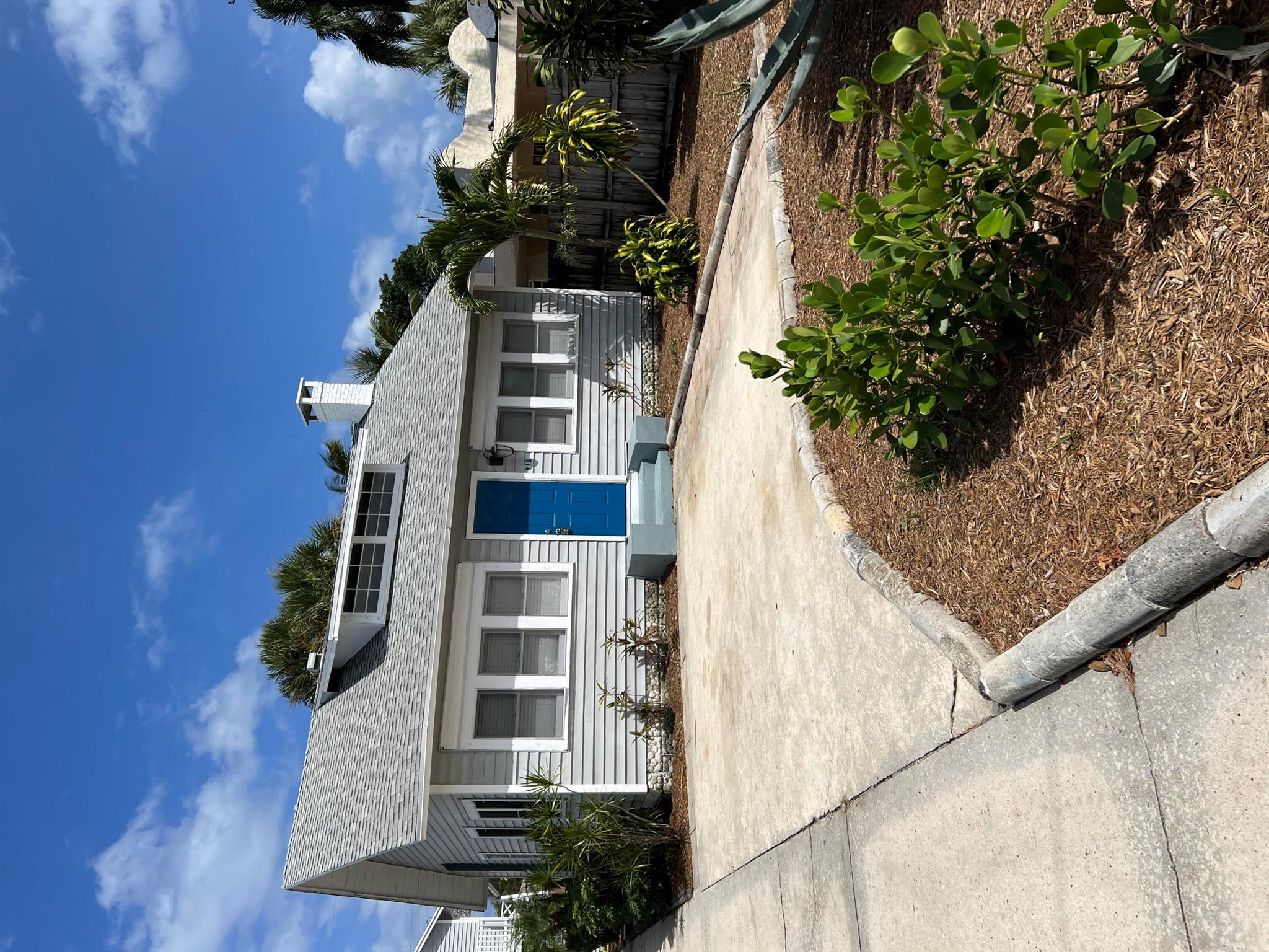 Charming 3/2 home with new flooring, new kitchen cabinets, stove, microwave located east of Dixie, large Kitchen, Laundry room, neutral paint, all appliances, Separate Dining Room, Private Parking, Central A/C, Just Blocks to downtown Lake Worth and the Beaches! Extra Storage Room. 3rd Bedroom with Separate Full Bathroom and Entrance. Close to South Palm Park and Bryant Park. Come make this your home. Classic Lake Worth charming cottage.