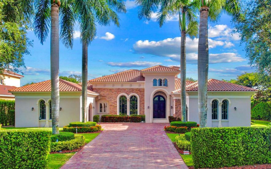 Welcome to Saddle Club Estates, a prestigious community located in the heart of Weston, Florida. Nestled on a 0.69-acre lot, this luxury estate offers an elegant living experience. As you step inside this magnificent home, you'll be greeted by 16 foot coffered ceilings. The spacious & inviting foyer, with exquisite marble floors that exude sophistication & opulence. The open floor plan flows into the main living areas, providing an ideal space for entertaining. The estate boasts five generously sized bedrooms, featuring its own en suite bathrooms, ensuring privacy & comfort. The primary bedroom is a sanctuary, with Hickory Pecan wood floors that add warmth & richness to the space. The chef's kitchen is a dream come true, equipped with Miele appliances, custom cabinetry & oversized island.