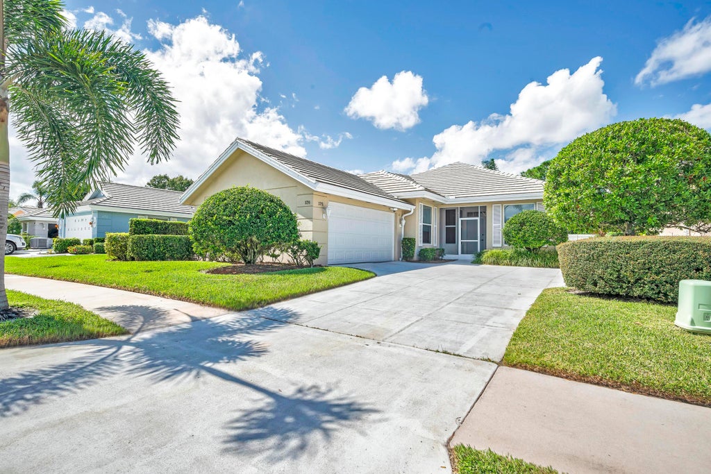 Photo of 176 NW Bentley Circle, Port Saint Lucie, FL 34986 (MLS # B26077919)