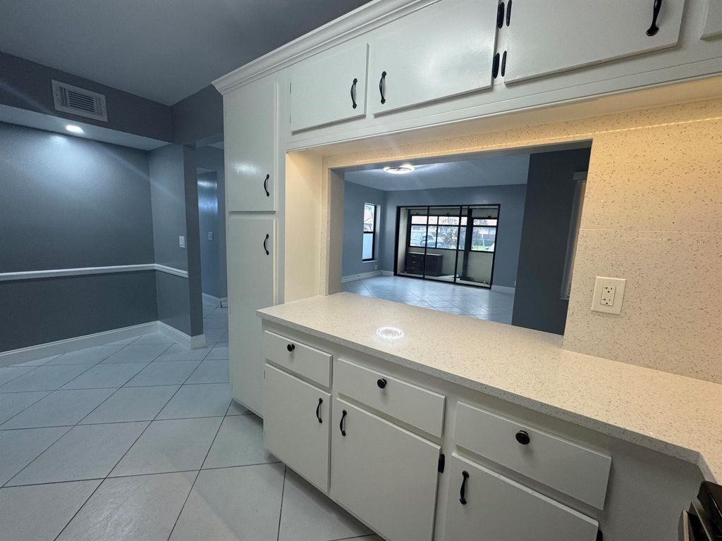 Photo of 802 Sky Pine Way #D1, Greenacres, FL 33415 (MLS # R11143153)