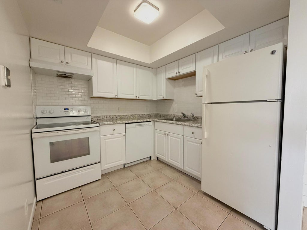 Photo of 3120 Collin Drive #Unit B, West Palm Beach, FL 33406 (MLS # B26038622)