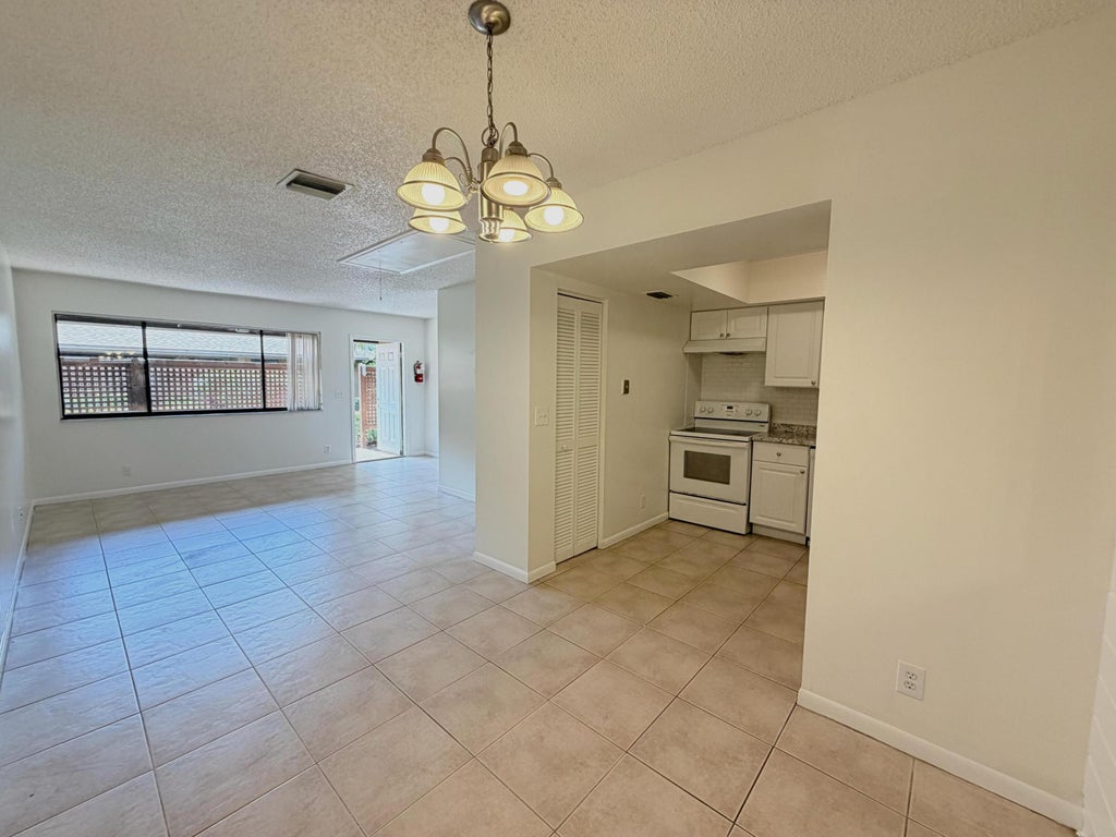 Photo of 3120 Collin Drive #Unit B, West Palm Beach, FL 33406 (MLS # B26038622)