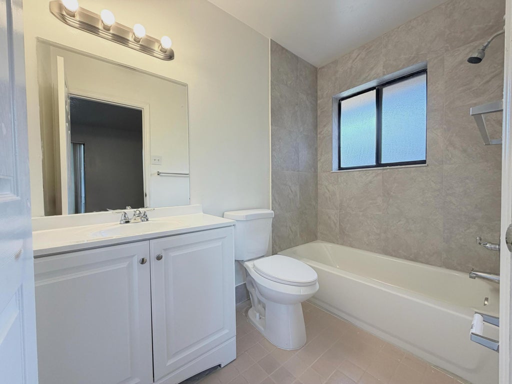 Photo of 3120 Collin Drive #Unit B, West Palm Beach, FL 33406 (MLS # B26038622)