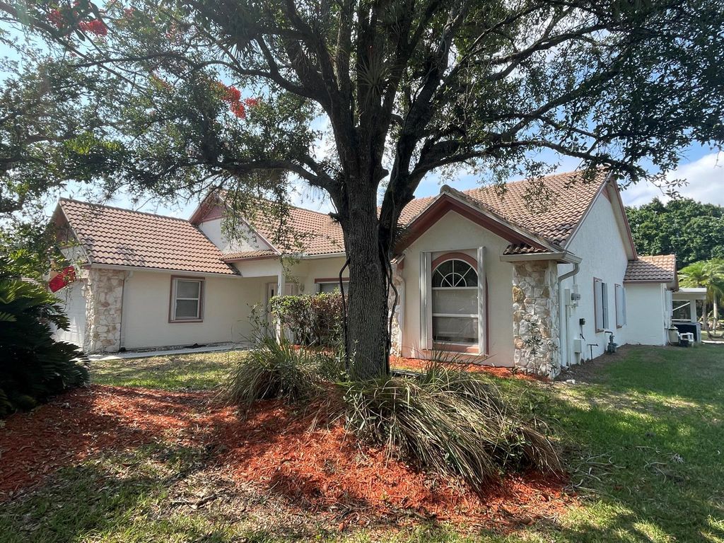Photo of 407 SW Redwood Cove, Port Saint Lucie, FL 34986 (MLS # R10987187)