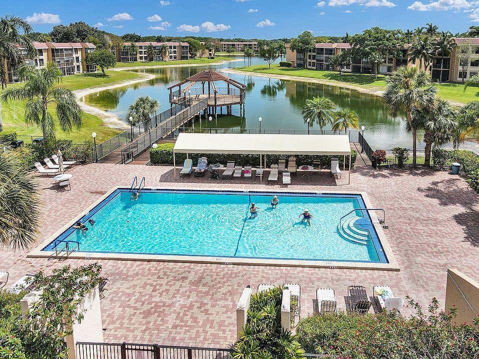 Photo of 6700 ROYAL PALM Boulevard #203D, Margate, FL 33063 (MLS # B26056261)