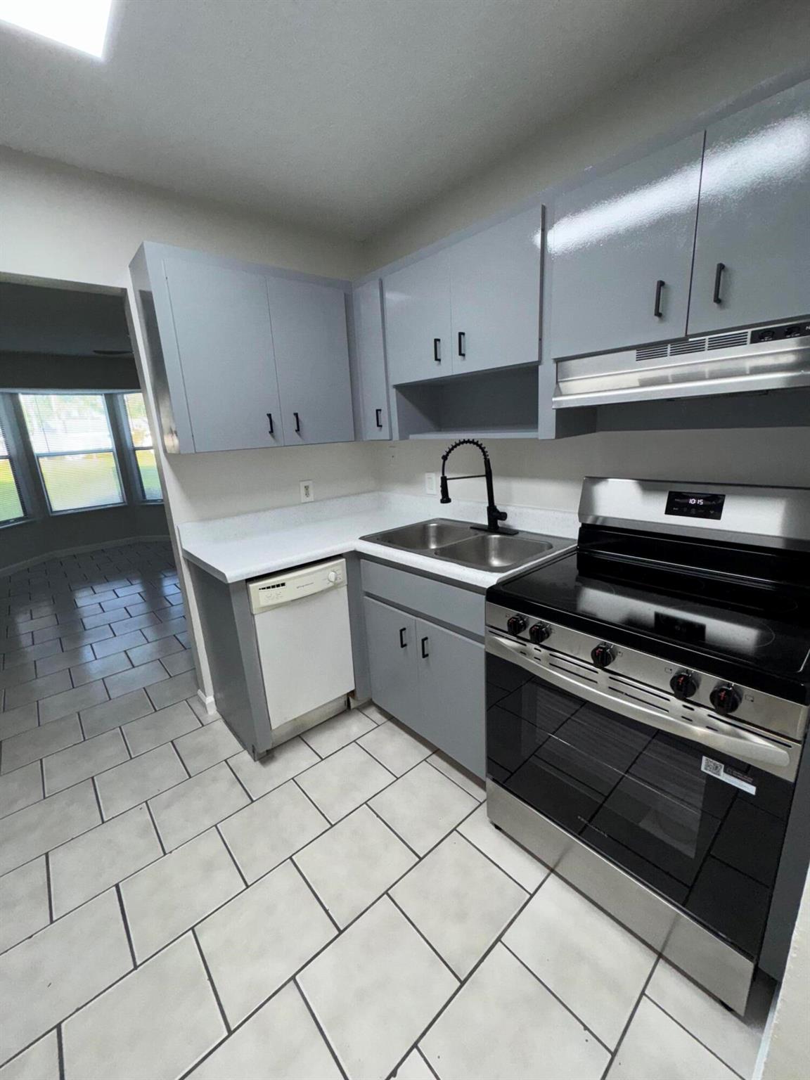Quite Location on this 1/Bedroom 1/Bathroom nestled on a private street. Unit has been freshly painted, New appliances & own washer and dryer included ,rear patio with a storage closet, central A/C. Note this is FPL electric & H20 is included. Parking lot an accommodate 2 cars maximum if needed. Rental is move in ready. This apartment has NO HOA, landlord restrictions do apply. Don't wait call today because this home will not last! Pets are welcomed, Ideal Landlords