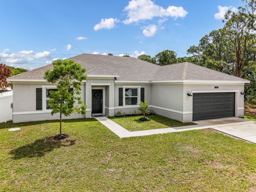 Photo of 1261 SW Curry Street, Port Saint Lucie, FL 34983 (MLS # B26011807)