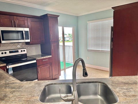 Tiny photo for 2606 Belmont Lane, North Lauderdale, FL 33068 (MLS # B26081163)