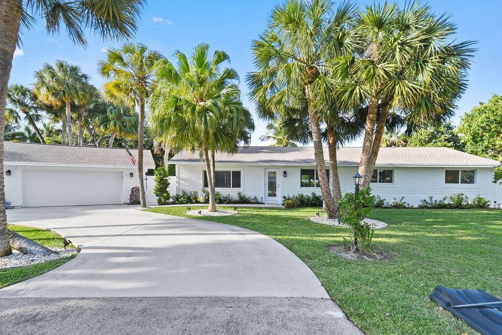Photo of 2419 Snug Harbor Drive, Palm Beach Gardens, FL 33410 (MLS # R10790361)