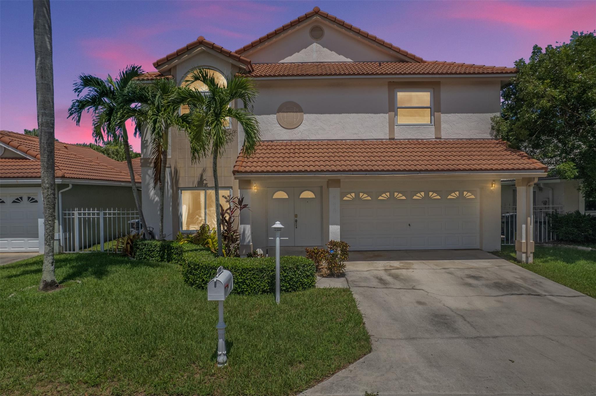 Price Improvement! 4-bedroom, 2.5-bath lakefront home with a 2-car garage in an A-rated school district and low HOA fees! This well-maintained home features impact windows, tile flooring throughout the first floor, and carpet upstairs, where all bedrooms are located. The updated kitchen includes stainless steel appliances (2.5 years old) & a bright open layout. The spacious primary suite offers a sitting area—perfect for a home office, nursery, or reading nook. Step outside to a screened-in patio overlooking the tranquil lake—ideal for relaxing or entertaining.