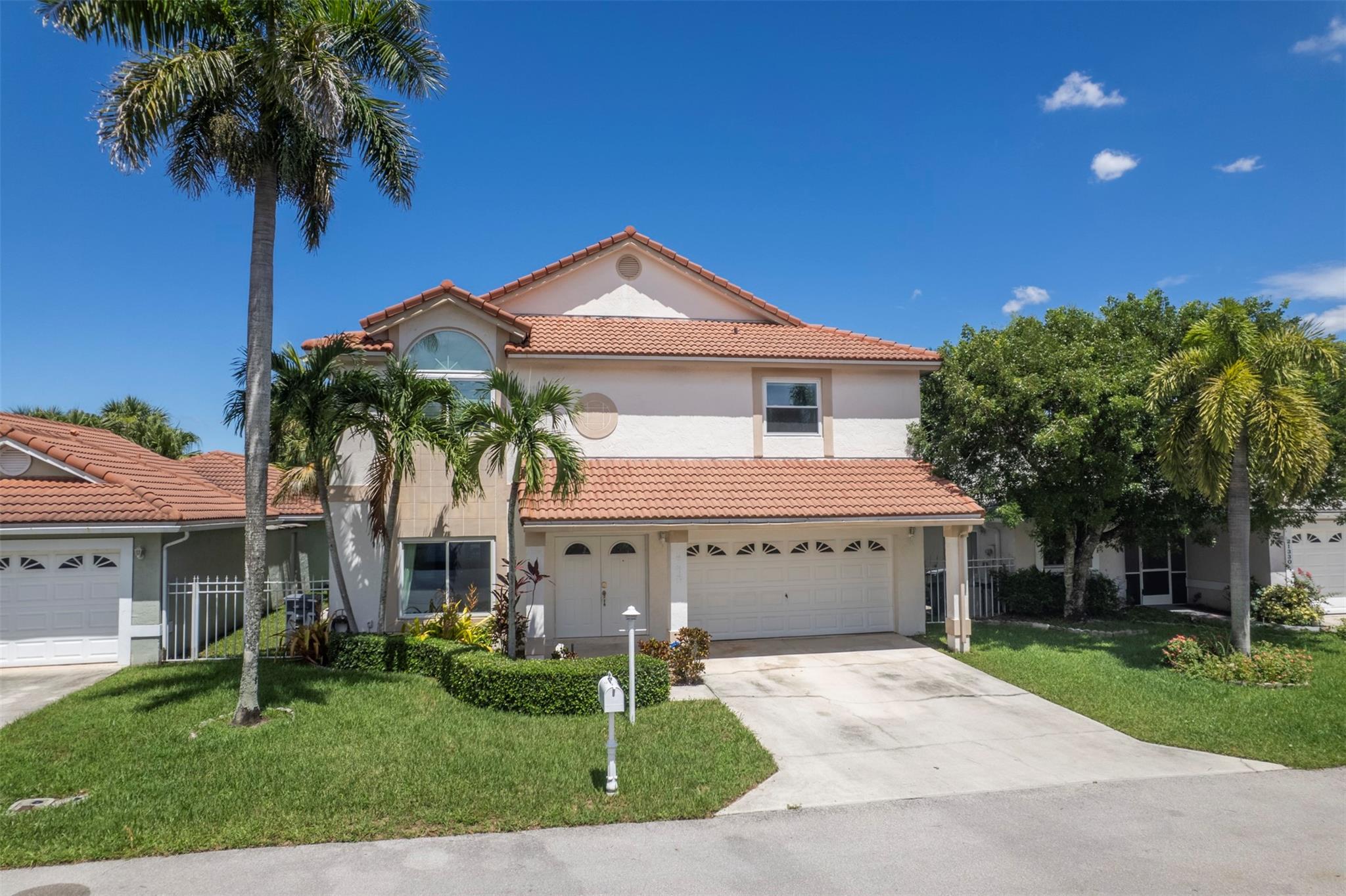 4-bedroom, 2.5-bath lakefront home with a 2-car garage in an A-rated school district and low HOA fees! This well-maintained home features impact windows, tile flooring throughout the first floor, and carpet upstairs, where all bedrooms are located. The updated kitchen includes stainless steel appliances (2.5 years old) & a bright open layout. The spacious primary suite offers a sitting area—perfect for a home office, nursery, or reading nook. Step outside to a screened-in patio overlooking the tranquil lake—ideal for relaxing or entertaining.