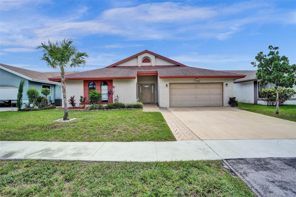 Photo of 3151 NW 107th Drive, Sunrise, FL 33351 (MLS # B26029609)