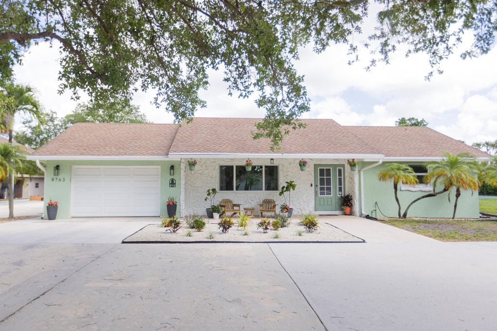 Photo of 8763 Pinion Drive #A, Lake Worth, FL 33467 (MLS # B26016337)