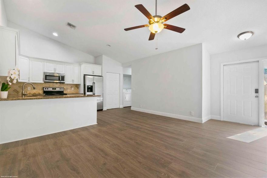 Welcome to this nicely updated, and freshly painted 2 bedroom, 2 bathroom unit, situated within a private quadruplex. New flooring throughout and a split floor plan with ensuite bathrooms for both bedrooms, providing privacy for everyone. Enjoy the outdoors on the open patio and in the backyard, backing up to a quiet canal. Nestled in the heart of Wellington, close to shopping, playgrounds and great schools. 2 assigned parking spots. No HOA and available for immediate move in. DISCLAIMER: All information provided to you regarding this Property by the realtor and her associates has been obtained from third parties such as the Multiple Listing Service, public records and other sources. All Tenants should independently verify all information provided regarding this Property. The Landlord Realtor and Listing broker make no representation as to the accuracy of this information. All Tenants should perform their own independent due diligence regarding this Property before executing a Lease for this Property.