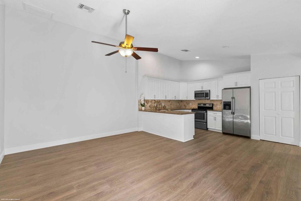 Photo of 1120 Hyacinth Place #Unit 1126, Wellington, FL 33414 (MLS # R11158198)