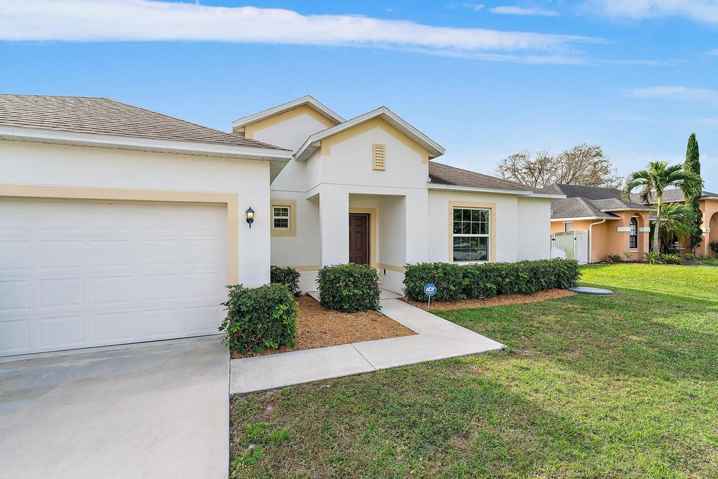 Photo of 474 SW Saginaw Avenue, Port Saint Lucie, FL 34953 (MLS # R10965595)