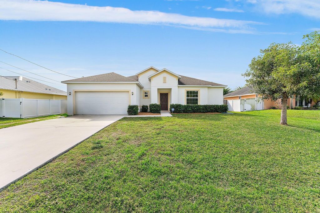 Photo of 474 SW Saginaw Avenue, Port Saint Lucie, FL 34953 (MLS # R10965595)