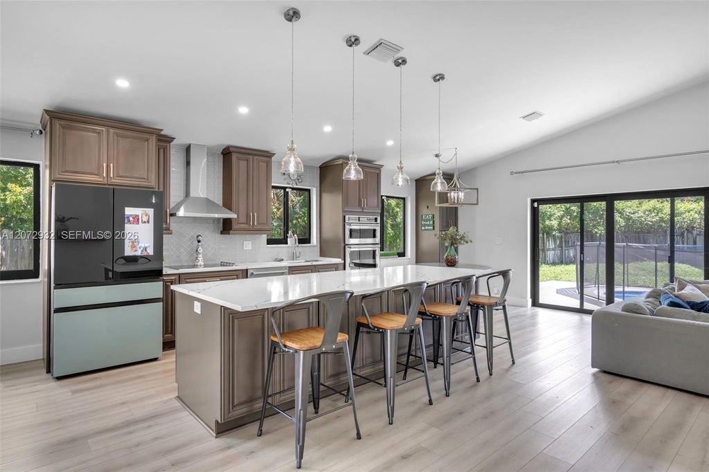 Photo of 1038 SW 120th Way #1038, Davie, FL 33325 (MLS # A12072932)