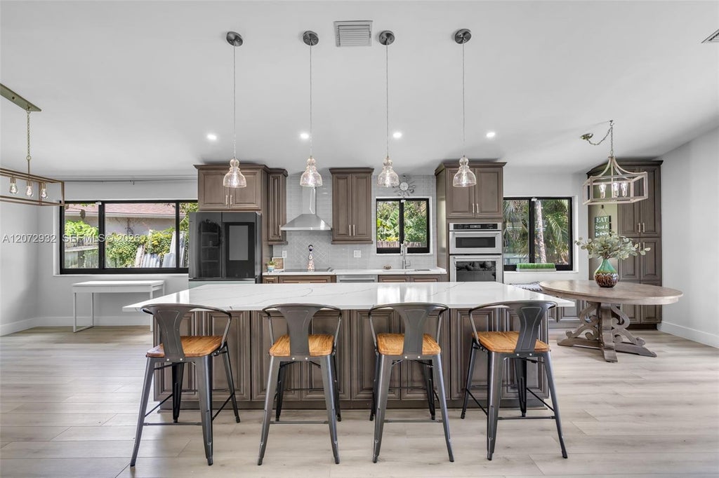 Photo of 1038 SW 120th Way #1038, Davie, FL 33325 (MLS # A12072932)