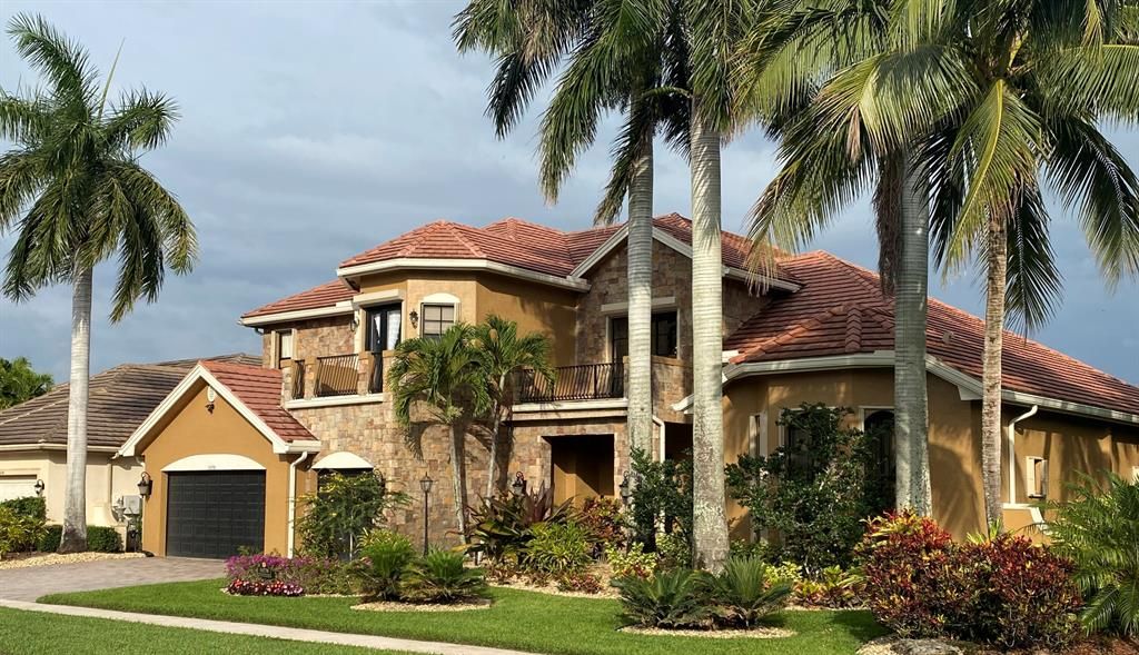 Photo of 10778 Versailles Boulevard, Wellington, FL 33449 (MLS # R10813362)