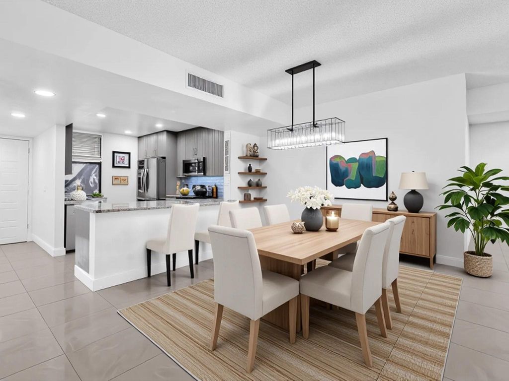 Photo of 2659 N Carambola Circle #106, Pompano Beach, FL 33066 (MLS # F10526972)