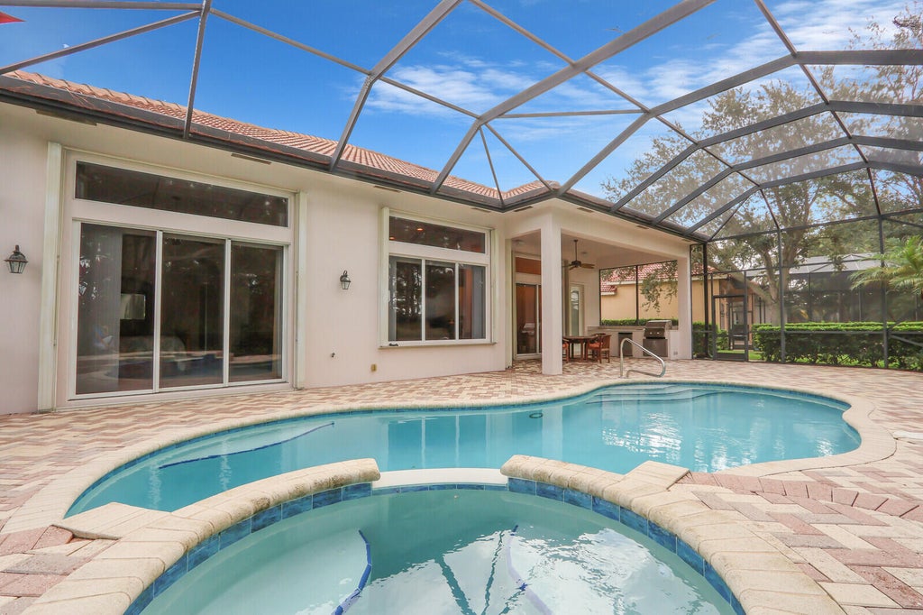 Photo of 8705 Tompson Point Road, Port Saint Lucie, FL 34986 (MLS # R11131813)