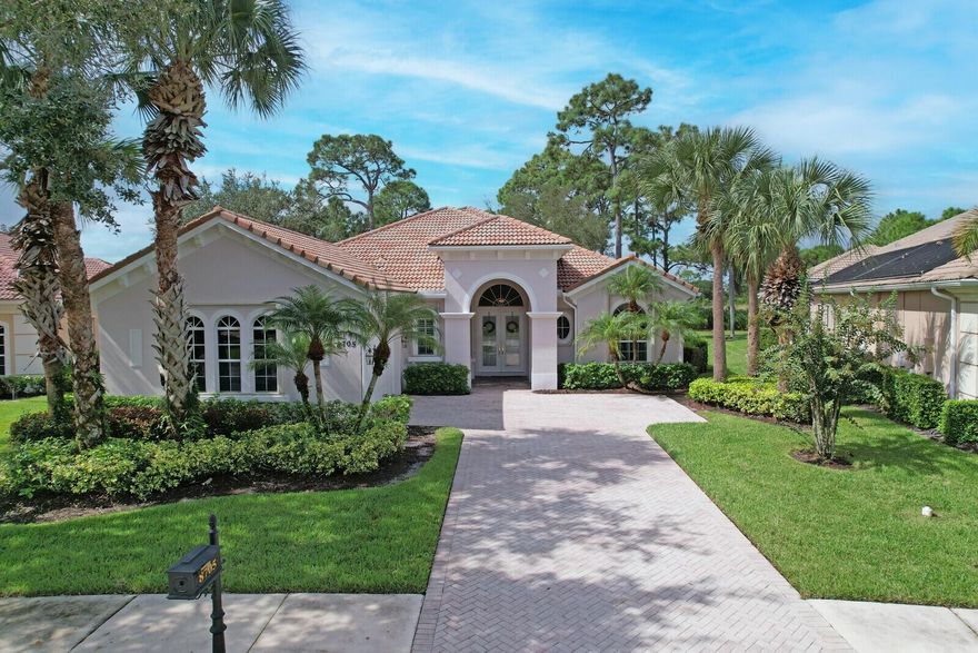 PERFECTLY POSITIONED ON THE GOLF COURSE!  Exquisite 3-bedroom plus den in desirable PGA Village. This 2,700 sq ft residence features a sought-after great room floor plan with 3 ensuite-bedrooms & powder room.  Enjoy elegant finishes including white cabinetry, granite countertops, SS appliances, wood detailing & a custom bar.  The outdoor oasis offers a resurfaced pool & spa (2024), summer kitchen & covered lanai-ideal for entertaining.  Meticulously maintained with newer A/Cs, whole house generator & accordion shutters, nearly all major systems replaced within 5 years.  Freshly painted inside & out, offered partially furnished-move-in ready with comfort, style & peace of mind!  PGA Village is a golfer's paradise with 4 golf courses & the Island club with pool, fitness, pickleball & more!