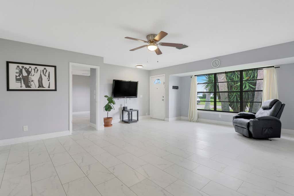 Photo of 2351 SE Stargrass Street, Port Saint Lucie, FL 34984 (MLS # R10955378)
