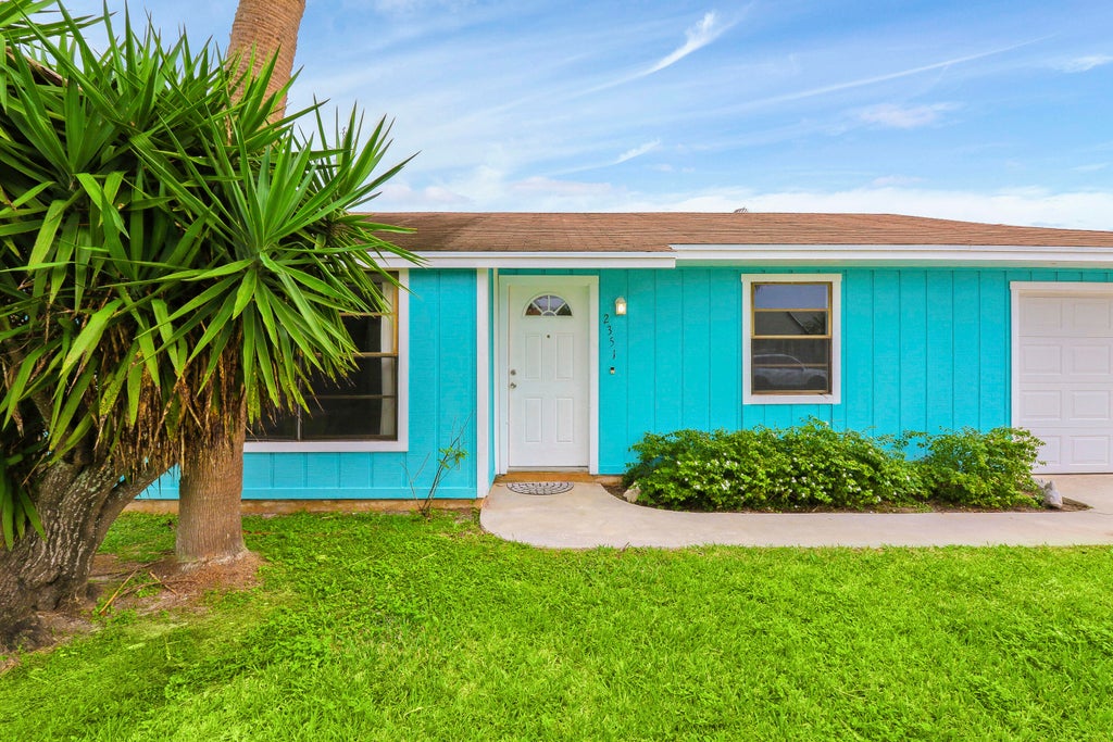 Photo of 2351 SE Stargrass Street, Port Saint Lucie, FL 34984 (MLS # R10955378)
