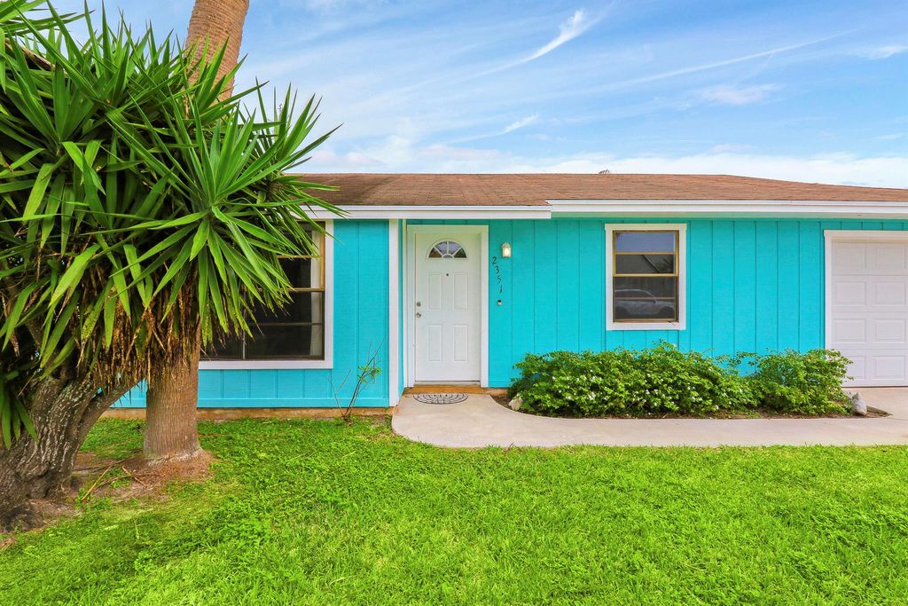 Photo of 2351 SE Stargrass Street, Port Saint Lucie, FL 34984 (MLS # R10955378)