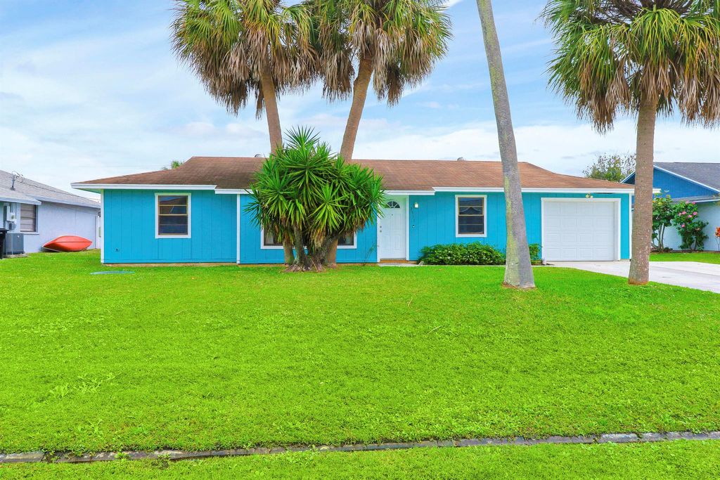 Photo of 2351 SE Stargrass Street, Port Saint Lucie, FL 34984 (MLS # R10955378)