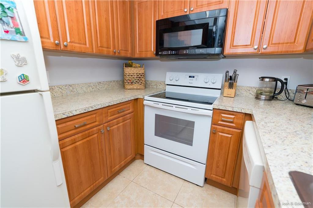 Photo of 2169 CHAMPIONS Way #2169, North Lauderdale, FL 33068 (MLS # B26074239)