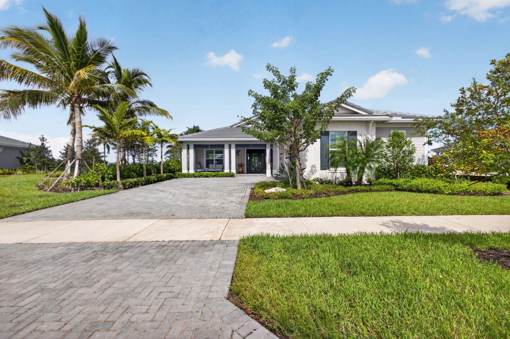 Photo of 10136 Timber Creek Way, Palm Beach Gardens, FL 33412 (MLS # B26086070)
