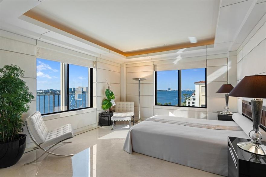 Breathtaking views of the Intracoastal Waterway, gardens and city skyline are showcased atop the landmark Palm Beach Biltmore in residence 712, an Architectural Digest Editors selection. A testament to ''AD Top 100 Architects'' David E. Martin and Charles T. Young, along with Award Winning Bettye Jordan Young and Notable Artisans for their ingenious Utilization of Space and Functional Design. Over 9 ft ceilings with illuminated soffits reveal meticulous craftsmanship and attention to detail in the Open and Flowing Floor Plan. Magnificent inlaid marble floors and baseboards with no thresholds. Rare Anigre book matched wall panels seamlessly conceal extensive storage areas. Principles of Bau-Biologie, Feng Shui and Modernism achieve a healthful and harmonious environment with intrinsic value