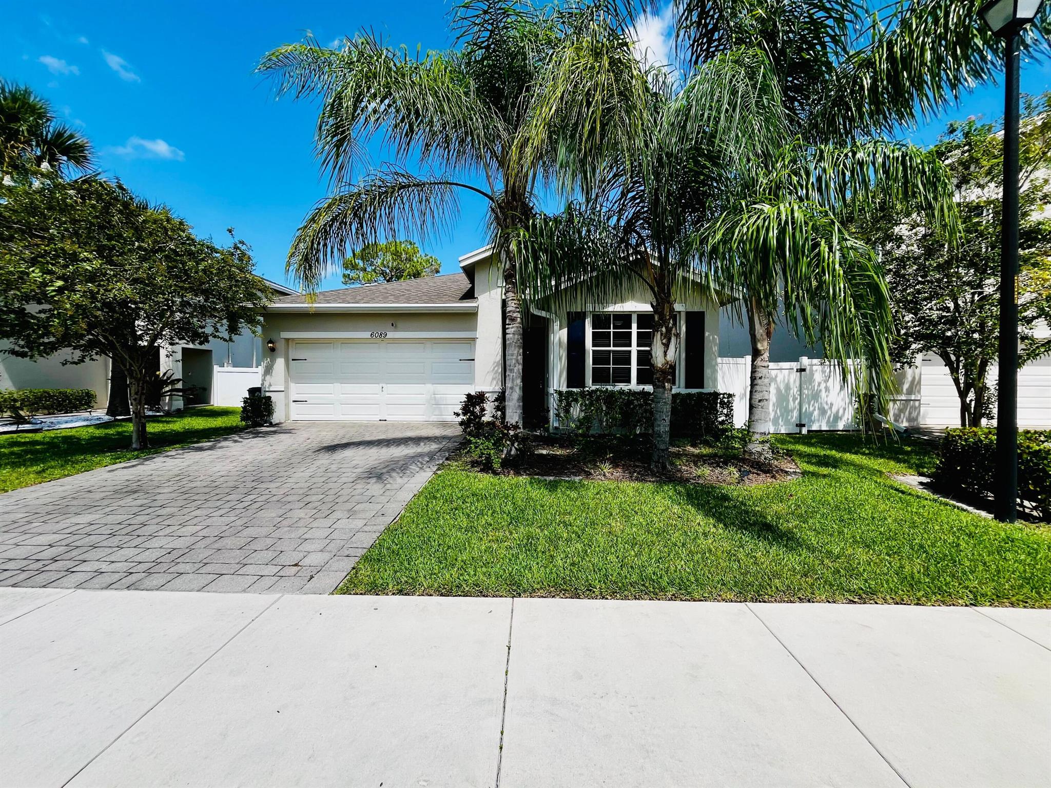 This beautiful home features high ceilings, a spacious screened-in patio, and a fully fenced yard--perfect for enjoying the outdoors in privacy. Located in a newer, quiet, and family-friendly neighborhood, the property has been recently upgraded and offers a peaceful backyard retreat ideal for relaxing or entertaining. The home is well-maintained and move-in ready, providing both comfort and convenience. Lawn care is fully covered by the HOA, making for truly low-maintenance living. We're looking for responsible, long-term tenants who will care for the home as their own. No pets allowed