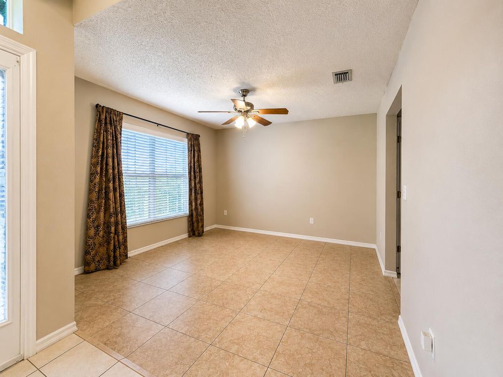 Photo of 1612 SW Rutland Street, Port Saint Lucie, FL 34987 (MLS # B26045774)