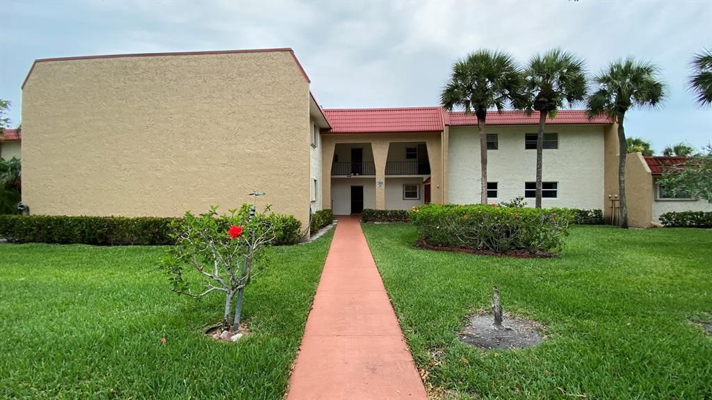 Photo of 107 Lake Evelyn Drive, West Palm Beach, FL 33411 (MLS # R10718630)