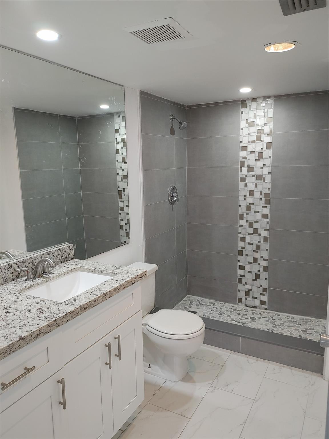 This 1-bedroom, 1.5-bathroom unit in the highly sought-after Century Village community is move-in ready with modern upgrades. Enjoy peace of mind with hurricane roll-up shutters and the convenience of an in-unit washer and dryer. The condo features spacious living with laminated floors, and updated kitchen and bathrooms. Century Village offers fantastic amenities, including a heated indoor pool, fitness center, tennis courts, and more, perfect for a vibrant and active lifestyle!Information deemed reliable but not guaranteed.
