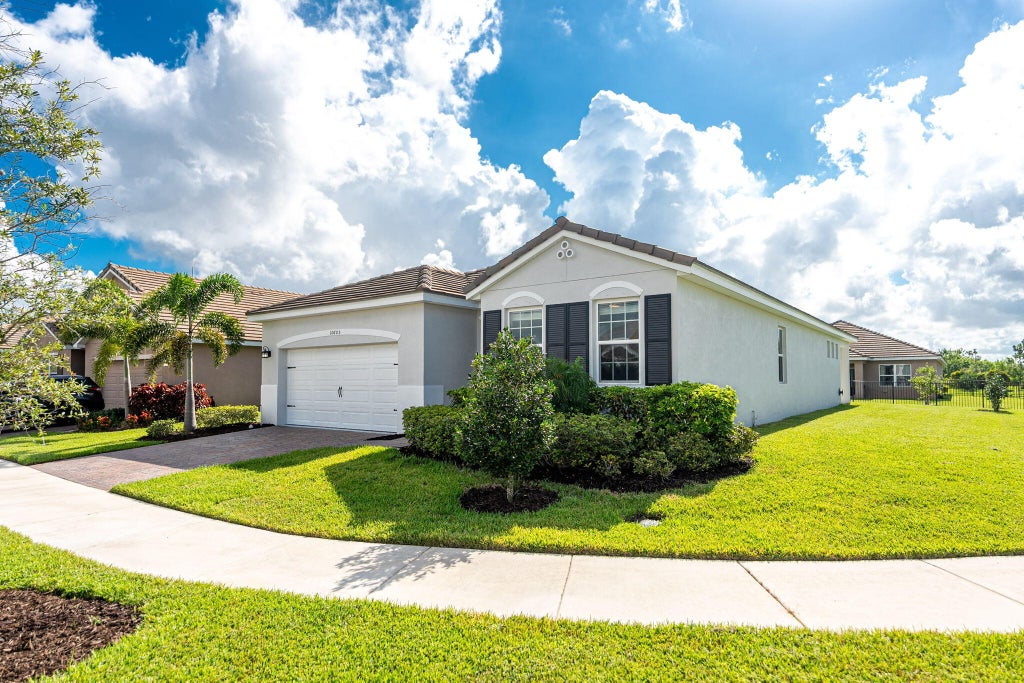 Photo of 10605 SW Jem Street, Port Saint Lucie, FL 34987 (MLS # R11117303)