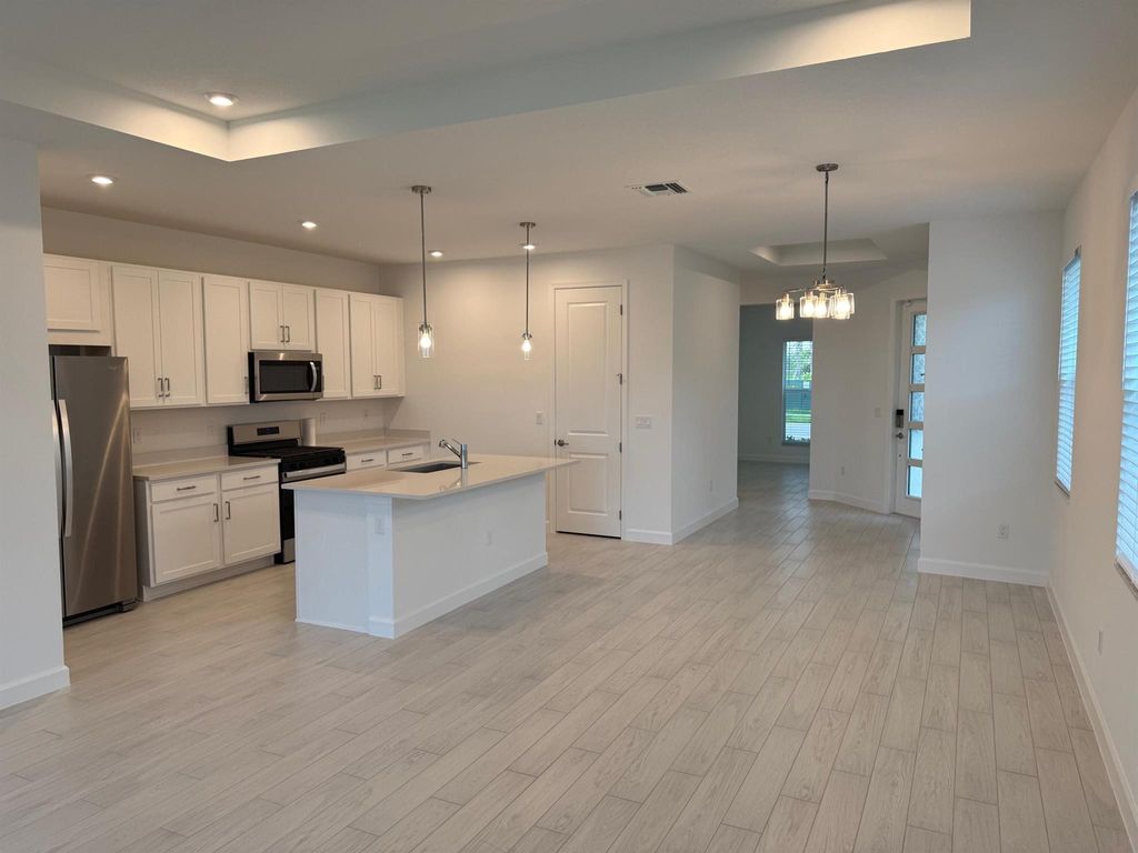 Photo of 9691 SW Indra Way, Port Saint Lucie, FL 34987 (MLS # R11094550)