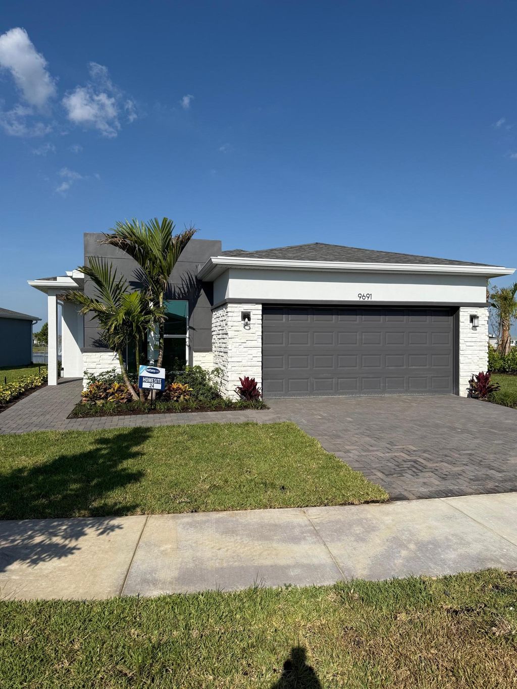 Photo of 9691 SW Indra Way, Port Saint Lucie, FL 34987 (MLS # R11094550)